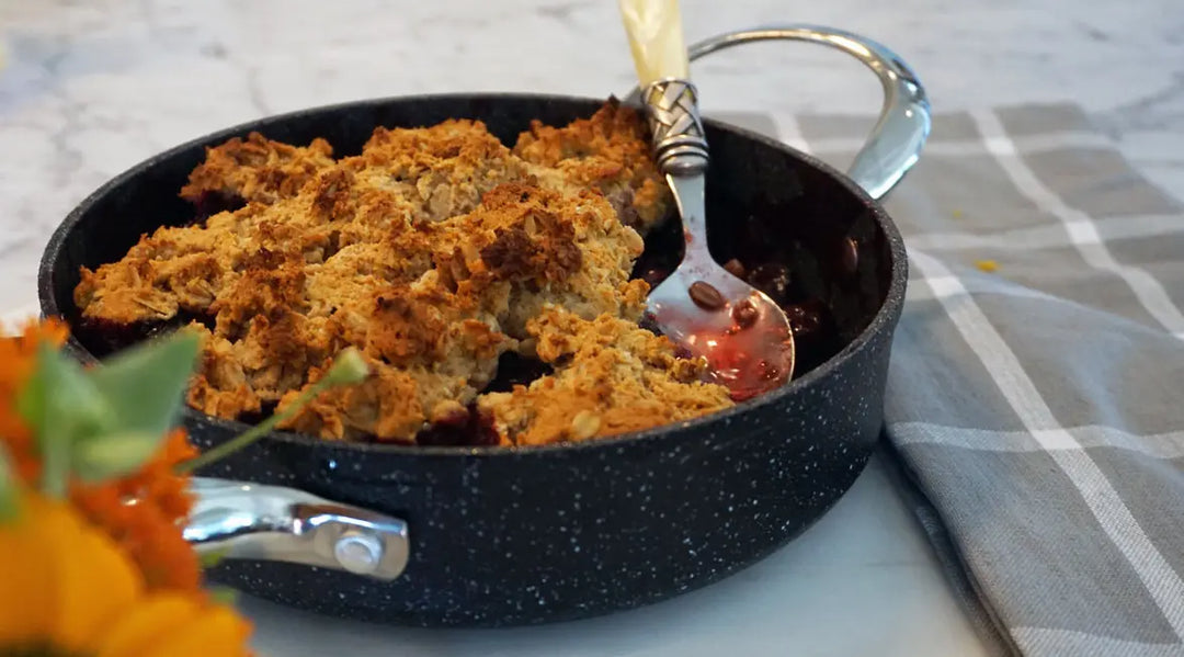 Gluten Free Cherry Cobbler on counter with spoon
