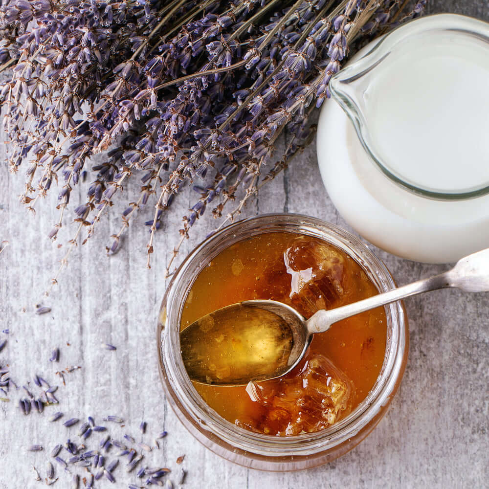 lavender milk and honey on white painted wood