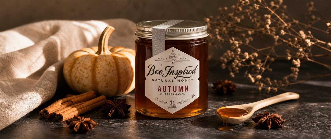 autumn honey on stone with pumpkin and cinnamon