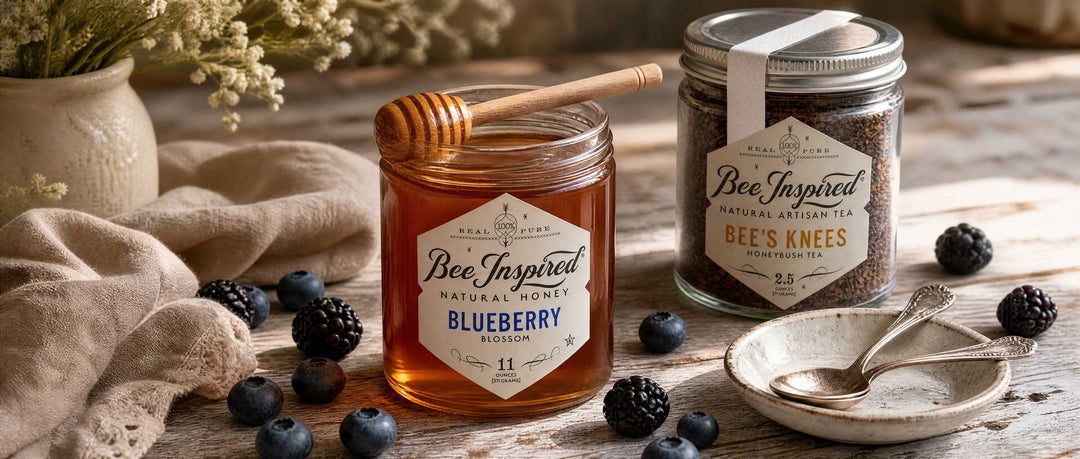 blueberry honey and bees knees tea with berries on wood table