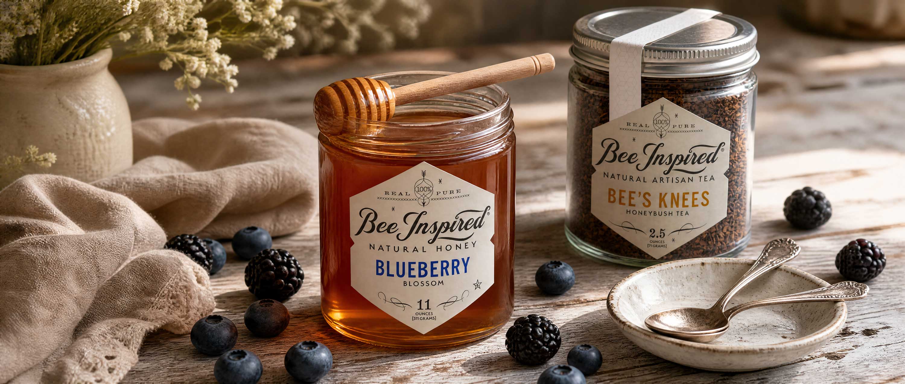 blueberry honey and bees knees tea with berries on wood table