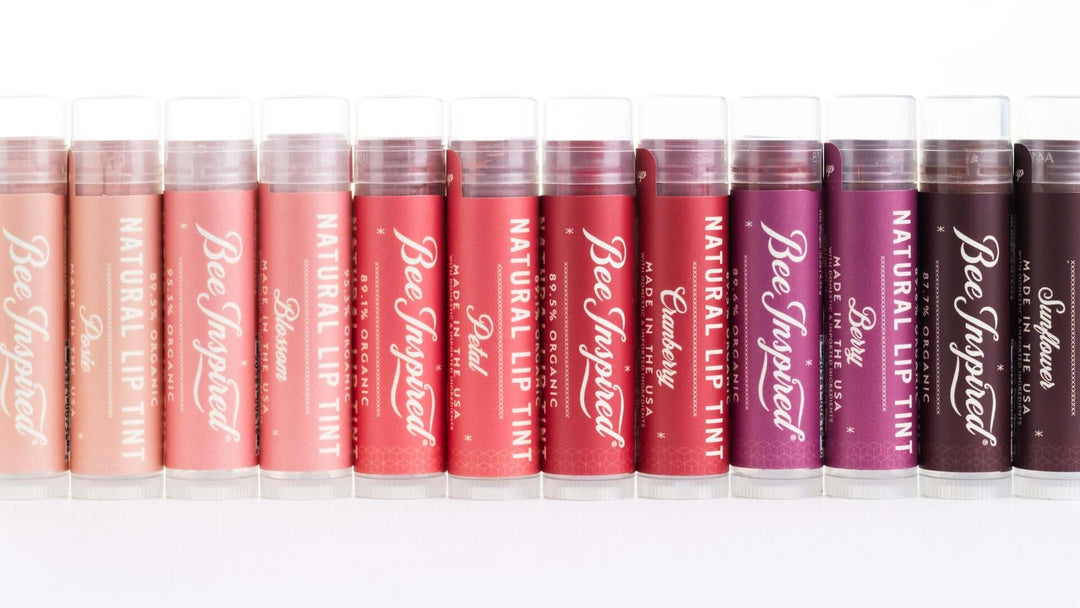 Bee Inspired Natural Lip Tints lined up in a row from lightest to darkest on white