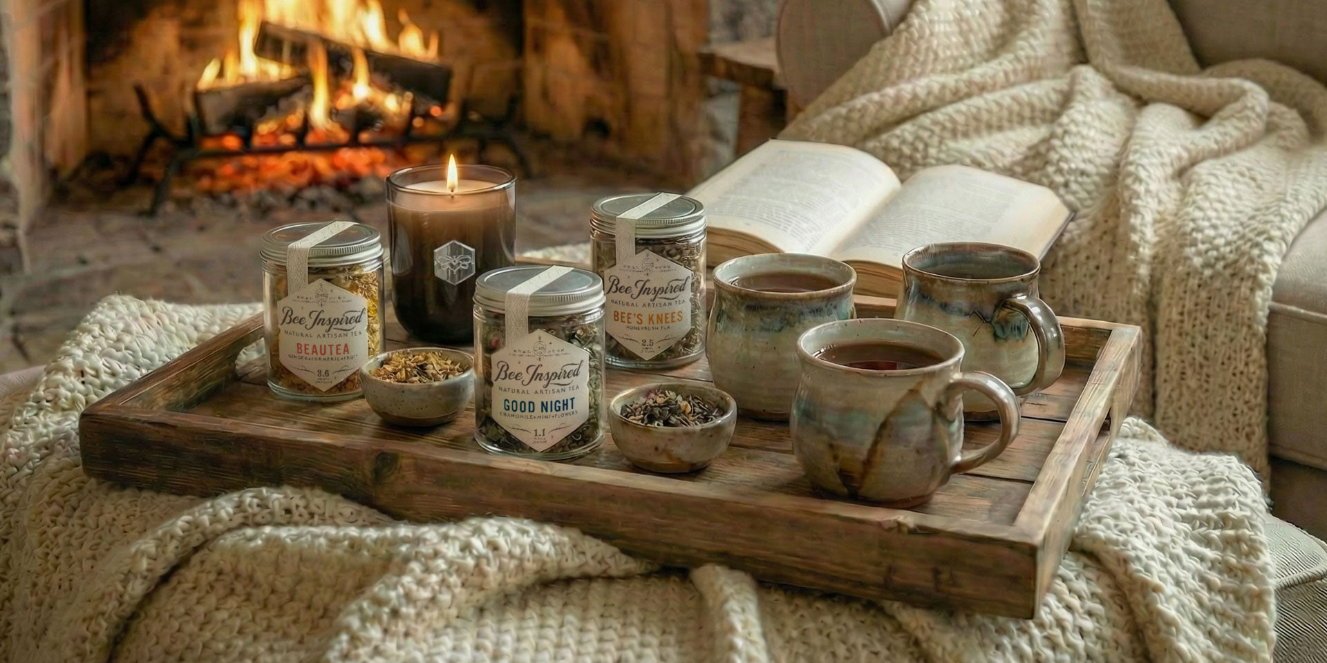 Assorted herbal teas and ingredients on a wooden surface with 'Bee Inspired' branding.