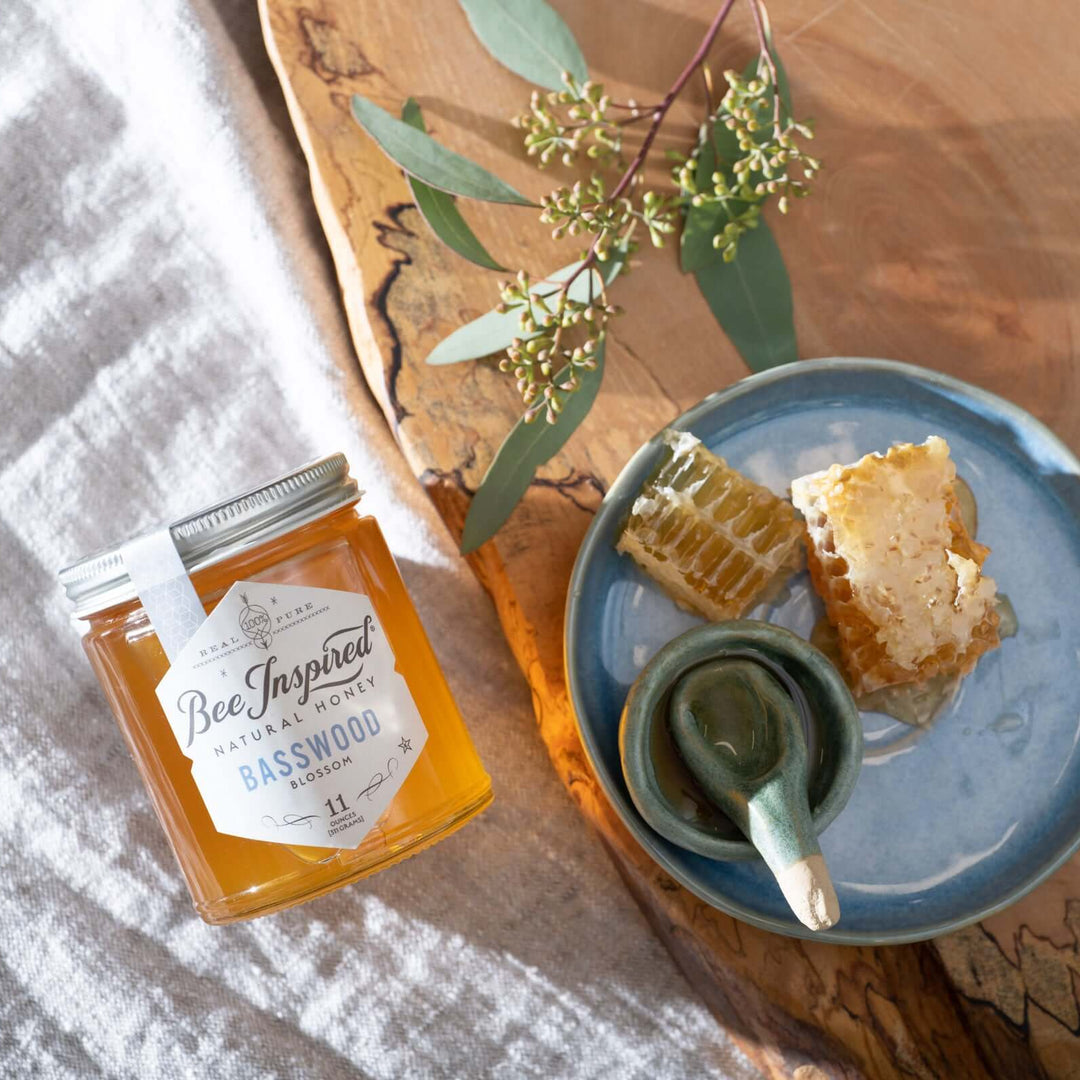 basswood honey from bee inspired honey retail store in owings mills on linen with wood