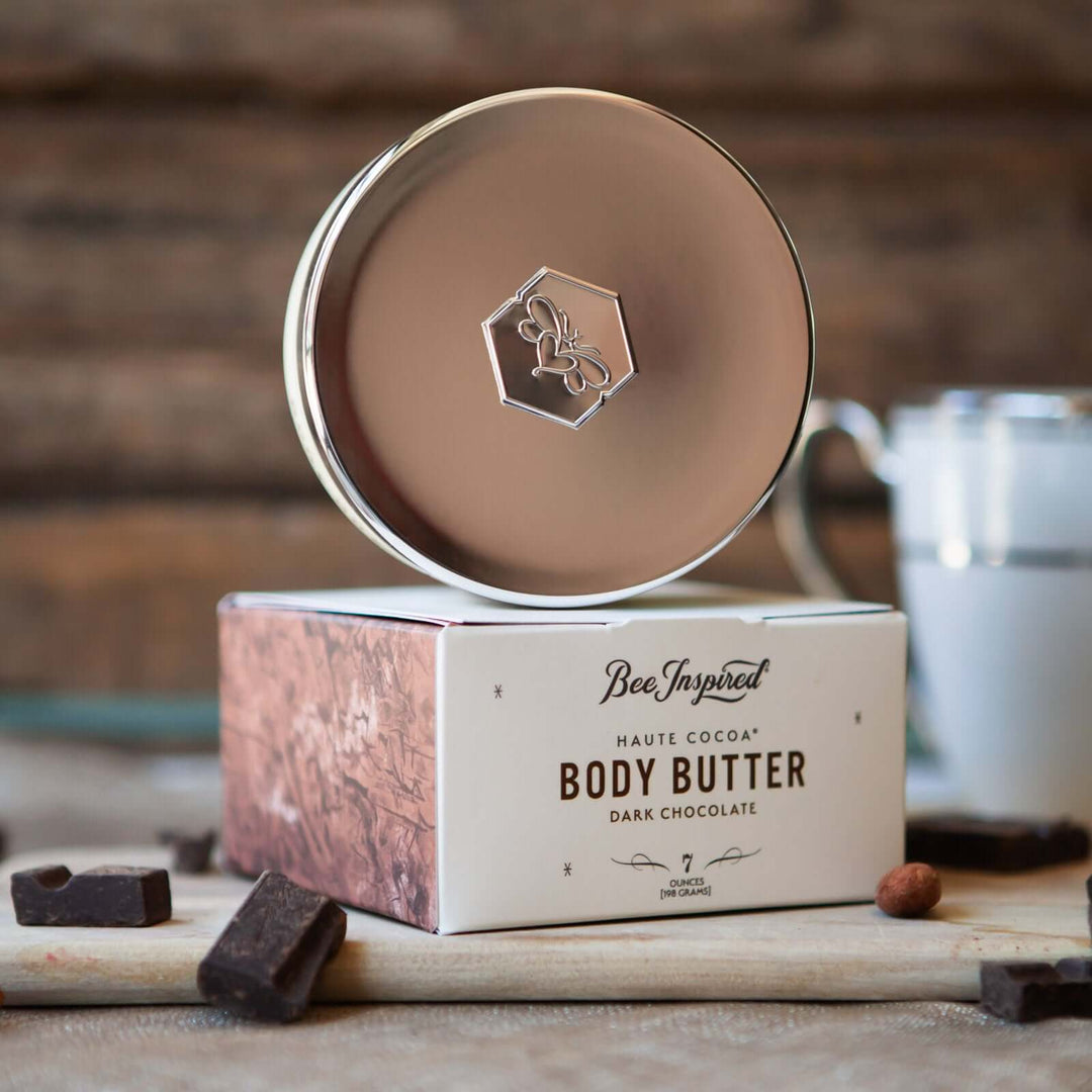 haute cocoa butter on its box with a mug and chocolate pieces 