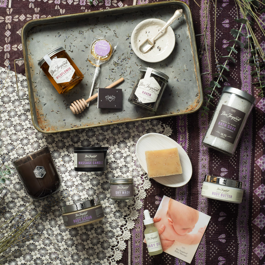 flat lay of Lavender Experience gift set on purple and white table cloths 