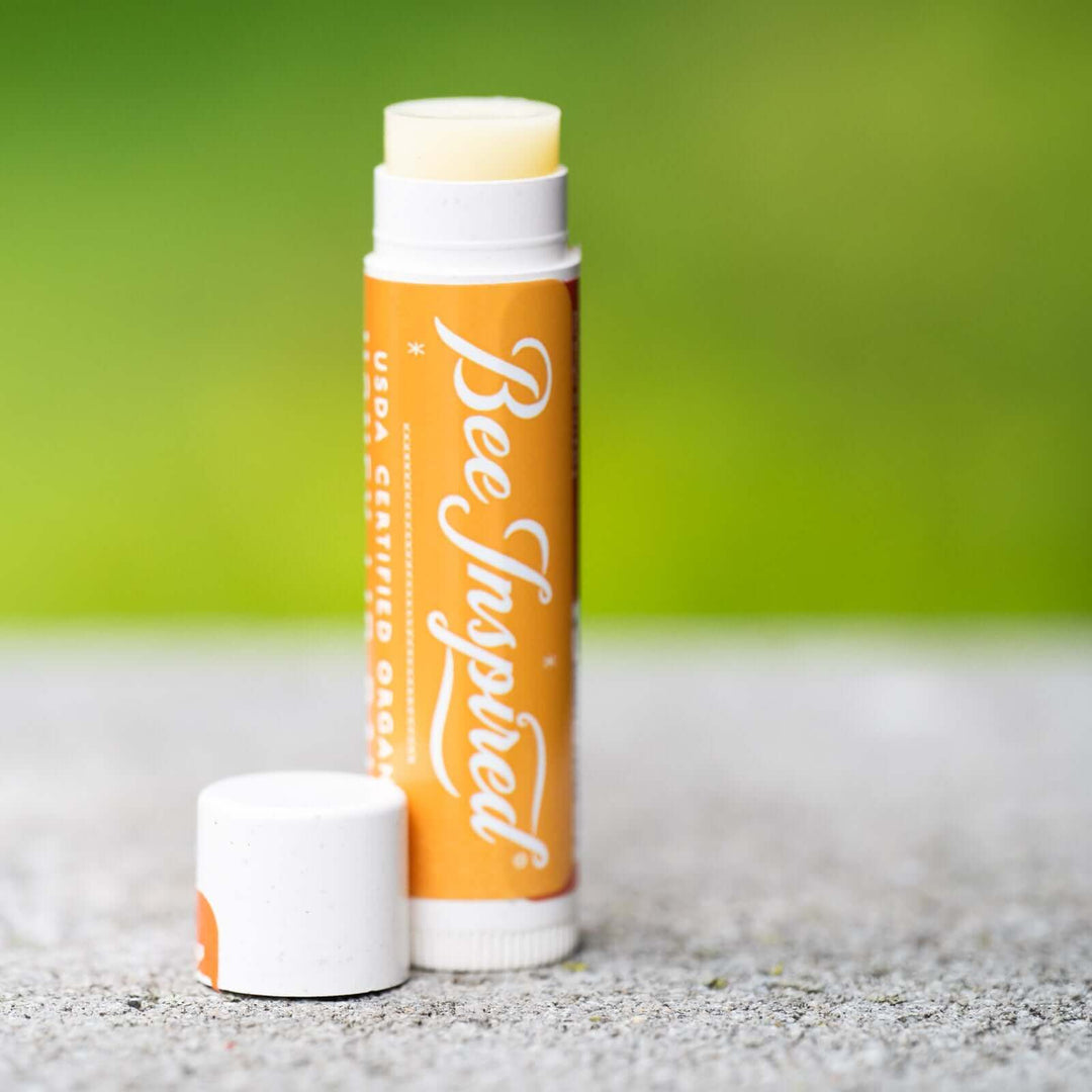 Honey lip balm on a rock 