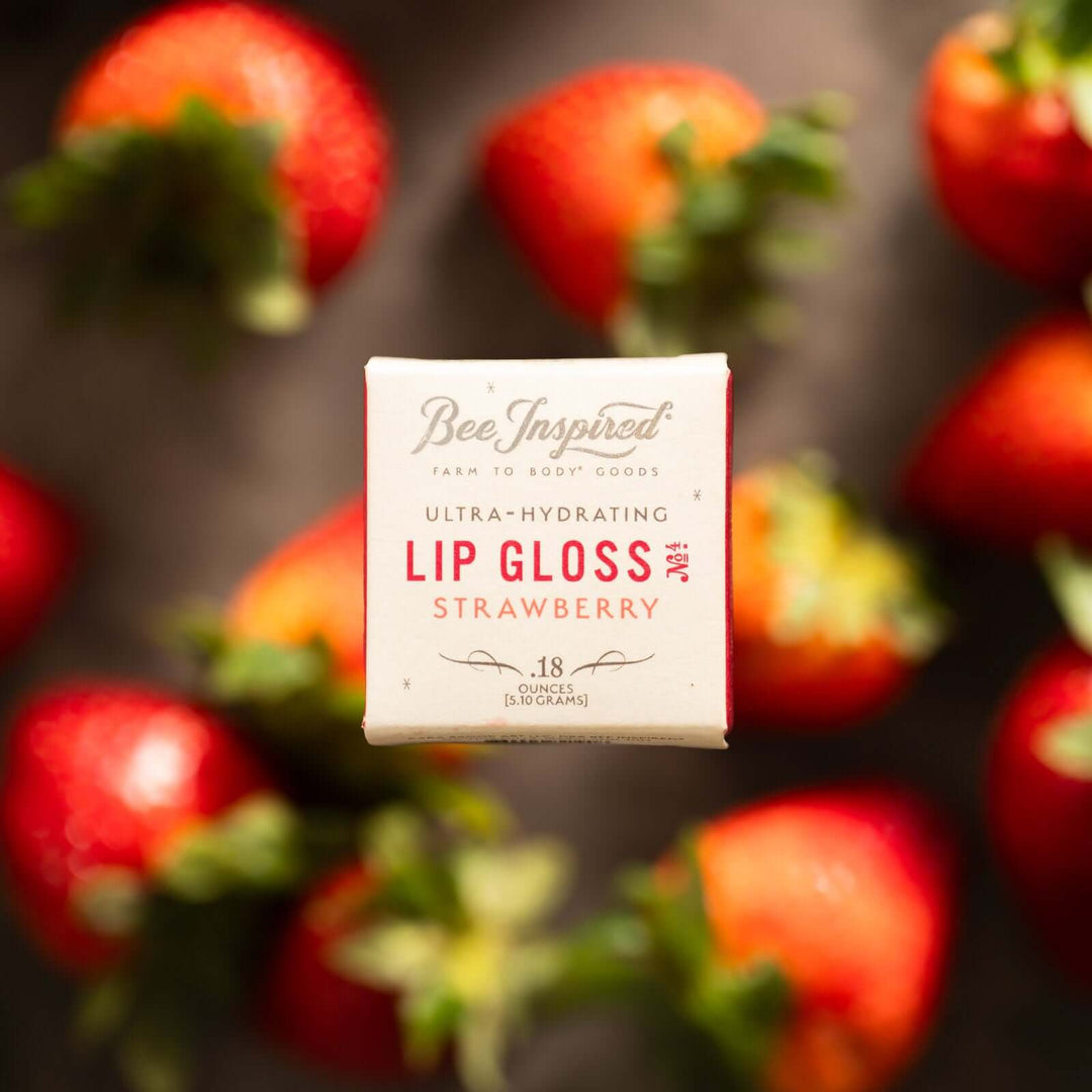 Strawberry lip gloss with strawberries 