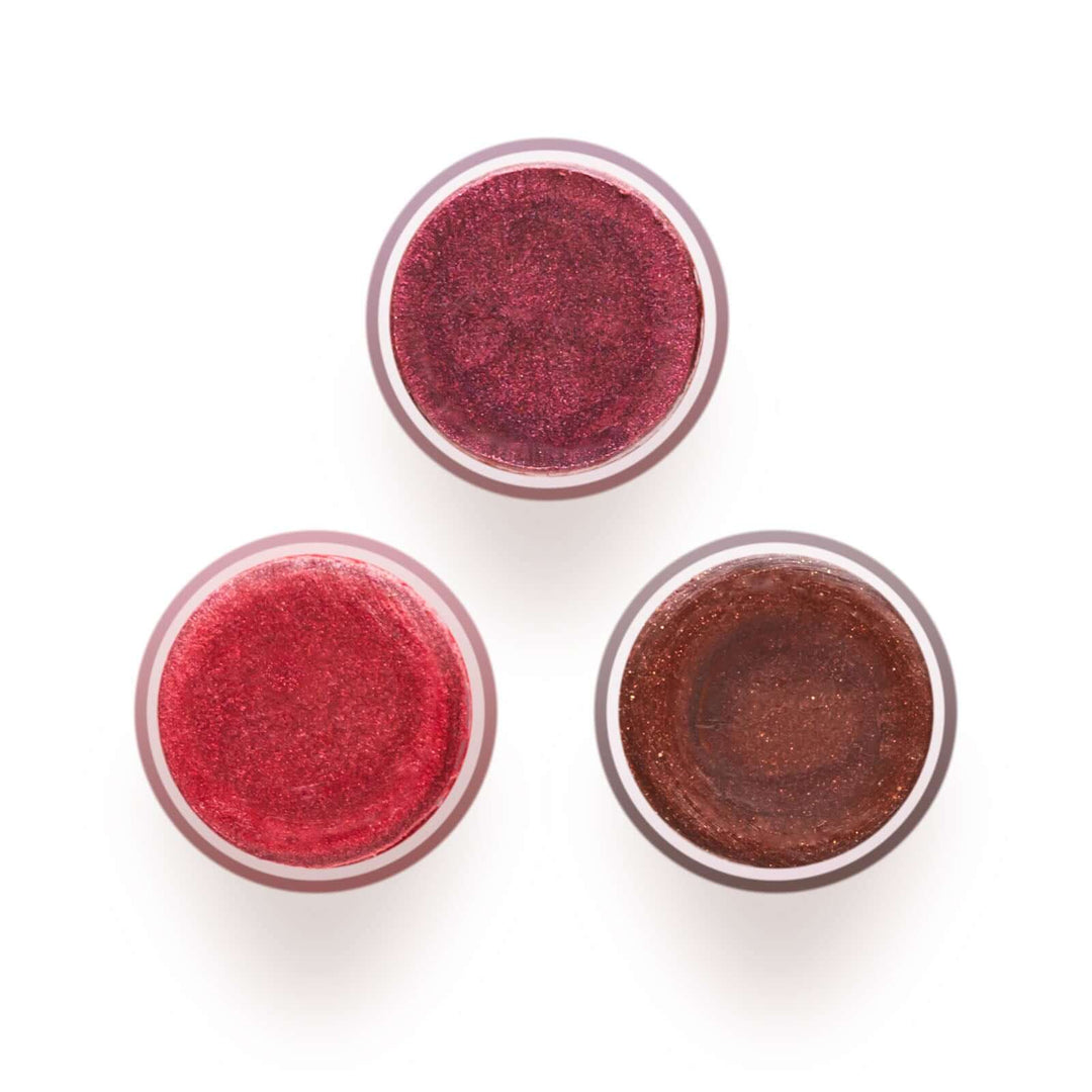Aerial view of the three Bold lip tint colors