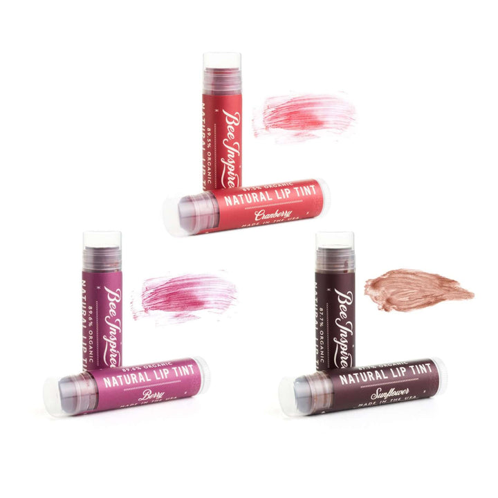 Bold lip tint tubes and their colors against white 