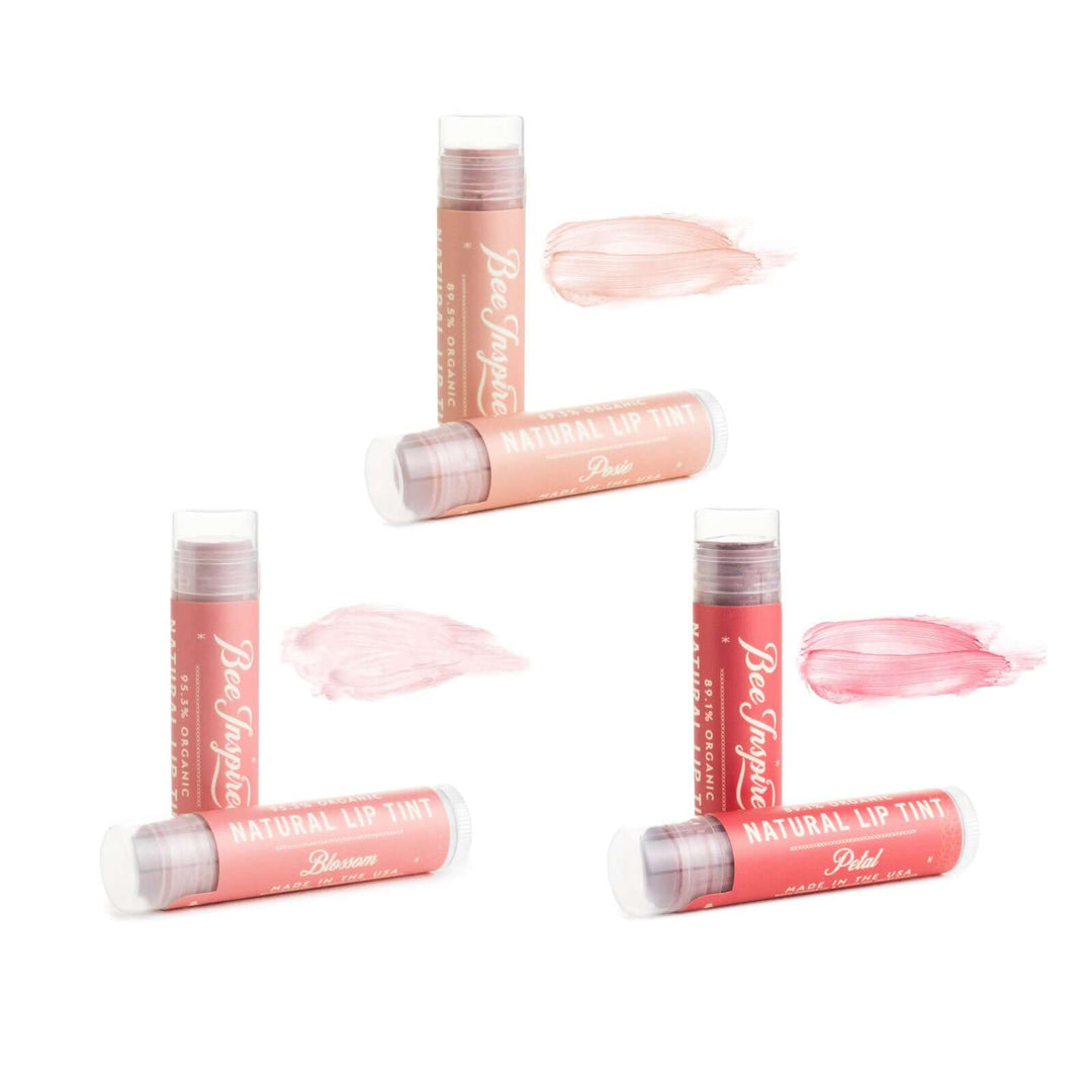 Natural lip tint tubes and their colors against white 