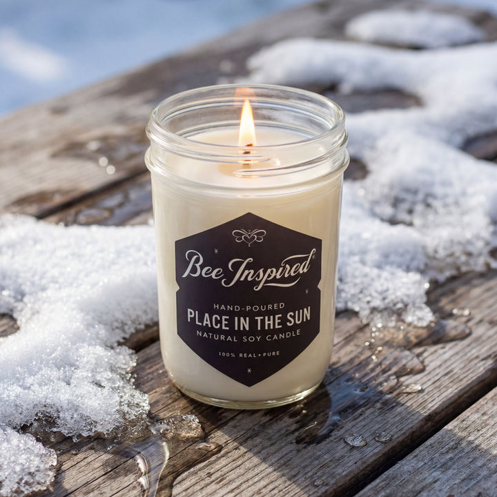 Candle in a jar labeled &