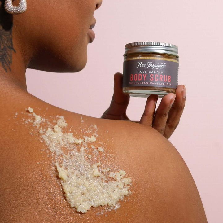 Rose Garden body scrub rubbed into someone&