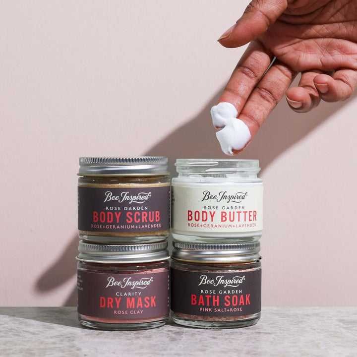Petite Spring Awakening set with Rose Garden body butter being taken out of jar