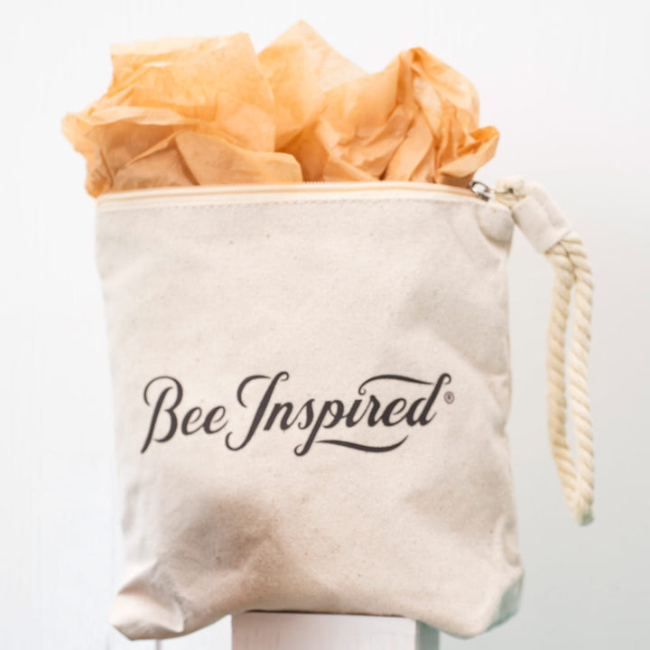 Beige drawstring bag with &