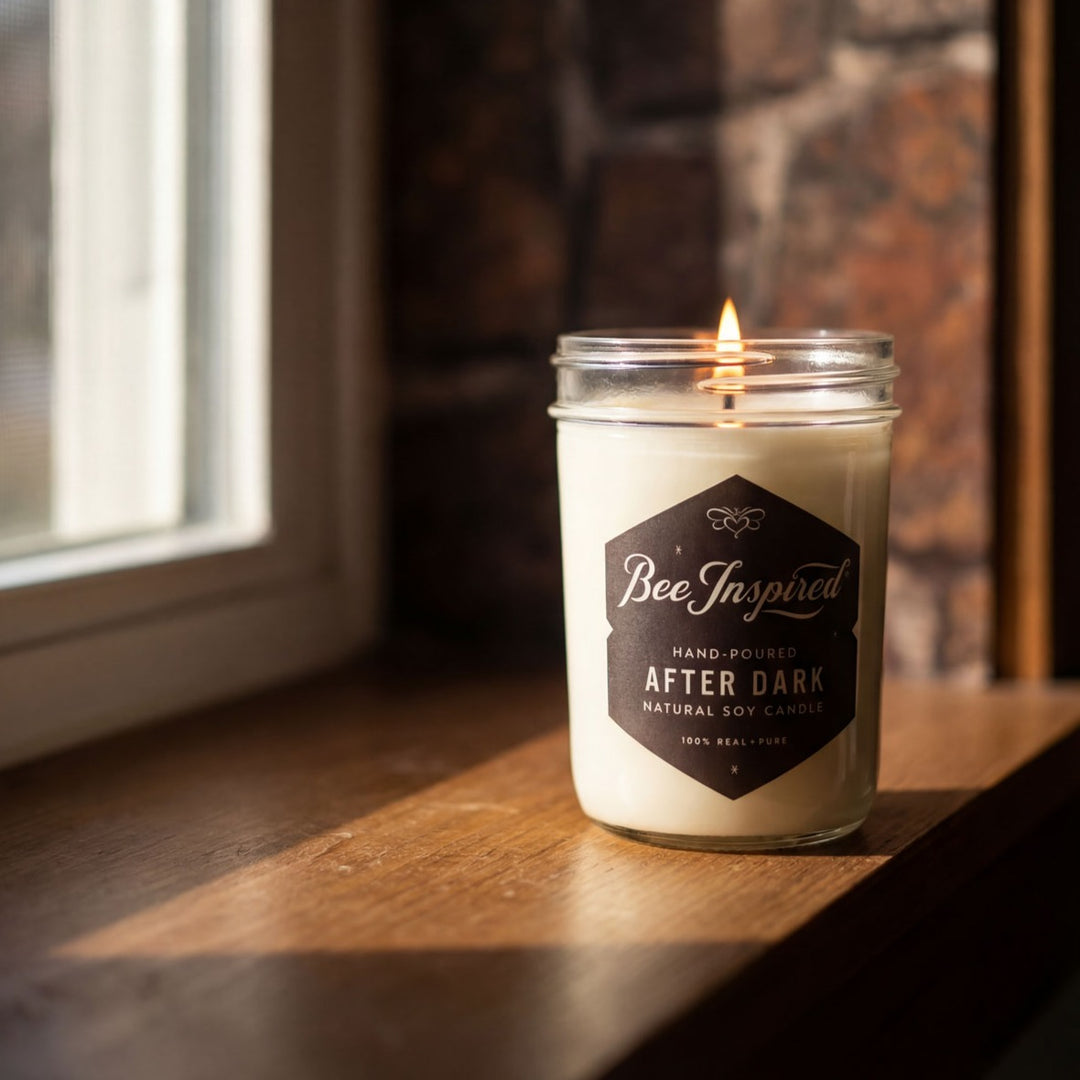 Candle in a jar labeled &