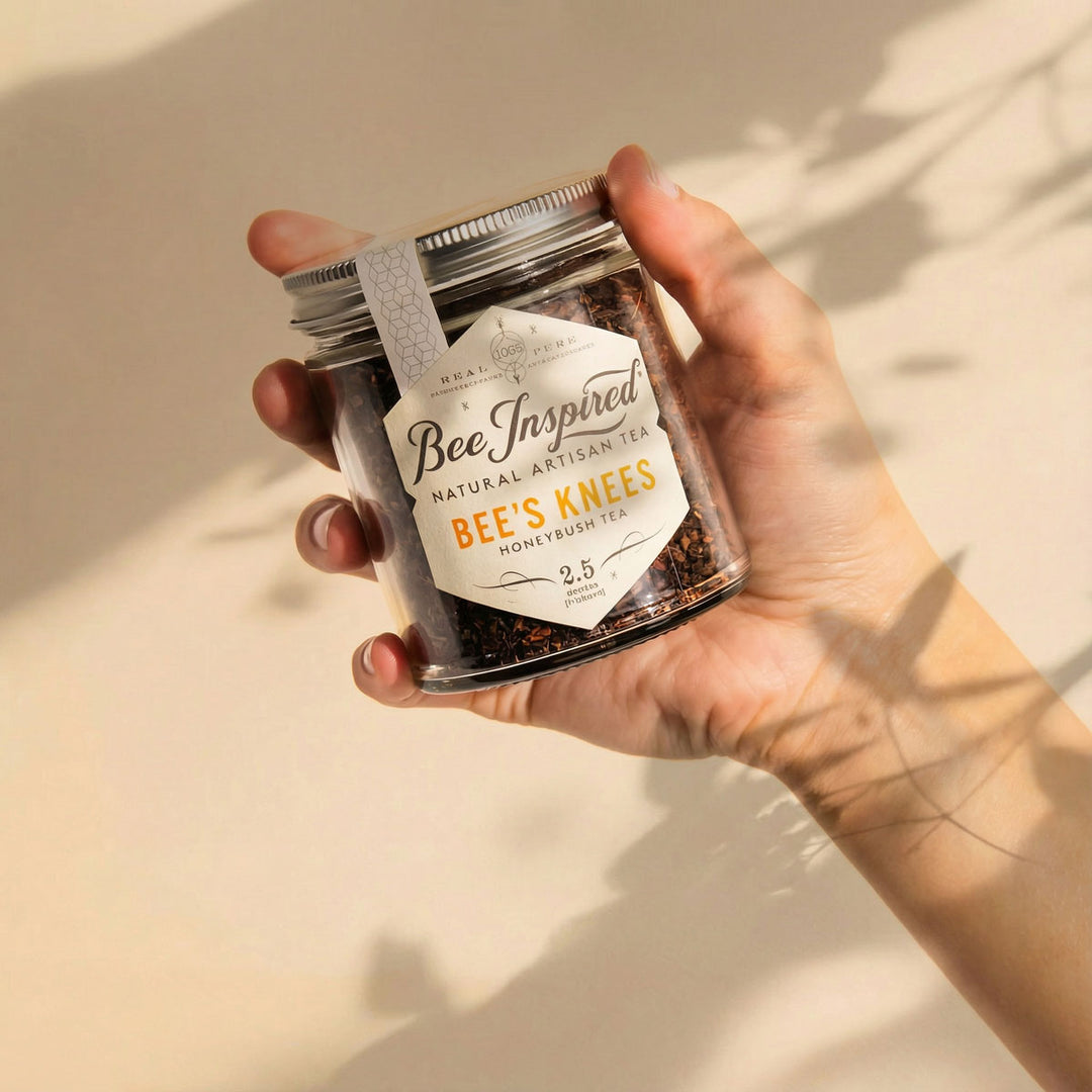Hand holding a jar of &