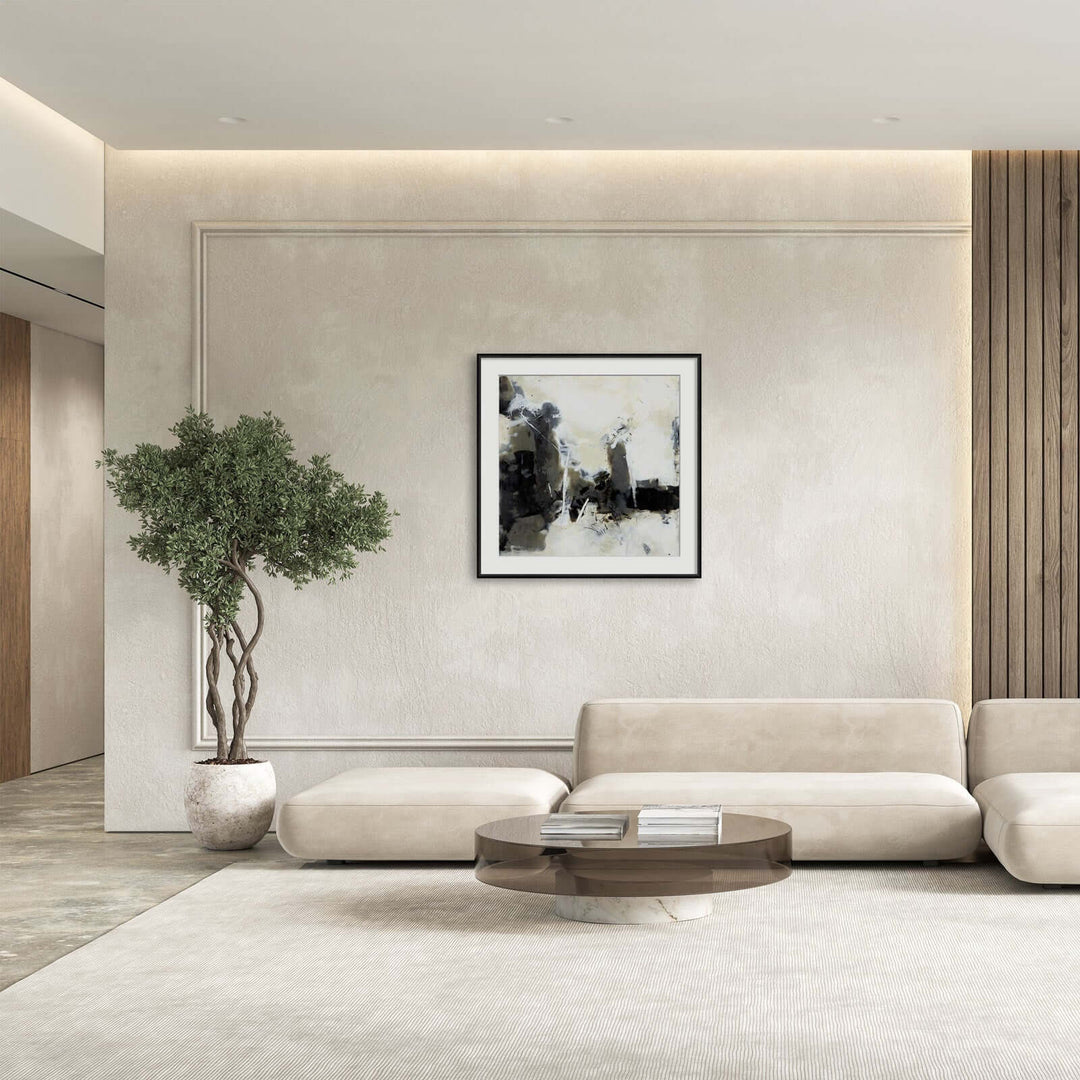 Living room with black and white painting on the wall 