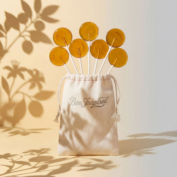 Bee-themed lollipops in a &