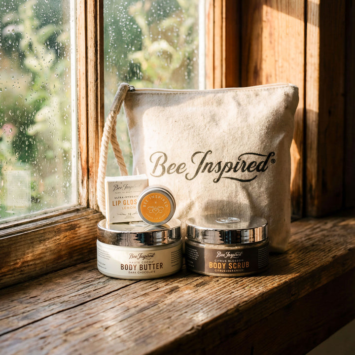 Bee-inspired skincare products on a wooden surface with a &