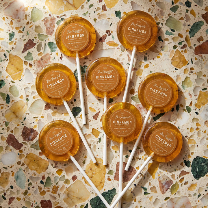 Cinnamon lollipops on a terrazzo countertop