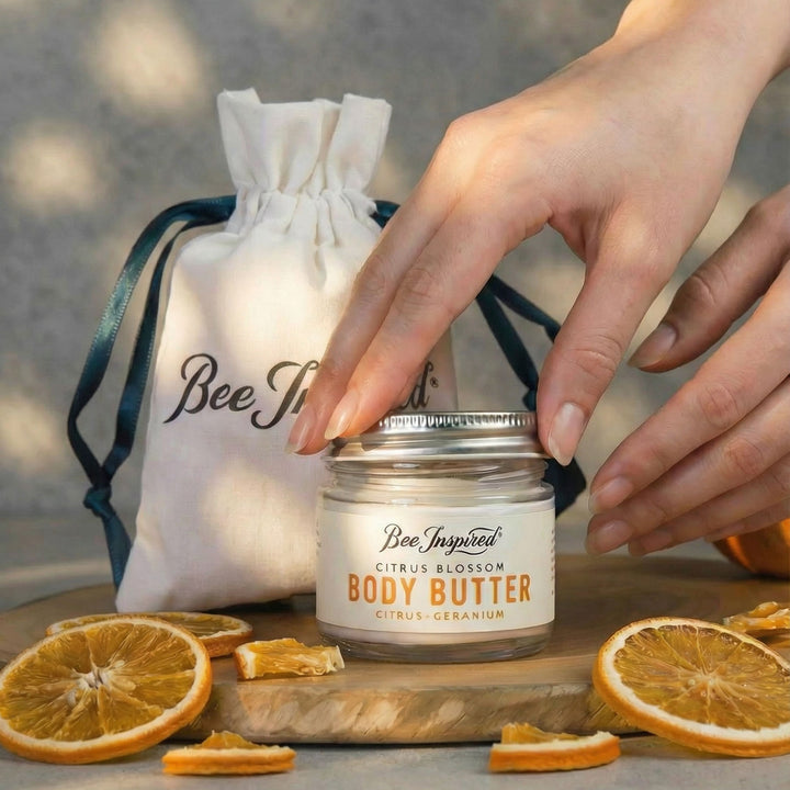 Hand holding a jar of &