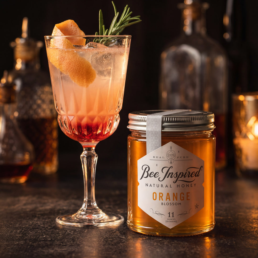 Cocktail with garnish next to a jar of &