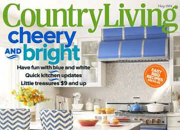 Cover of Country Living magazine with a white and blue kitchen 