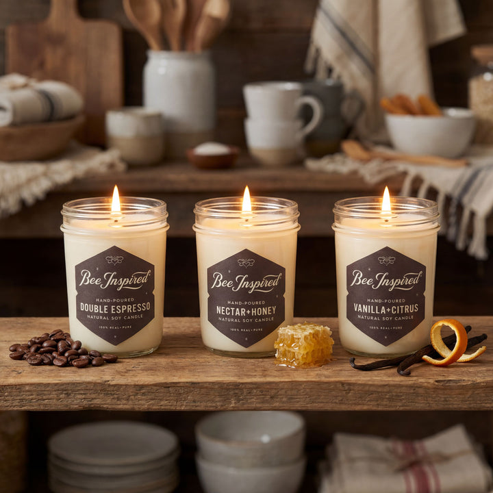 Three lit candles labeled &