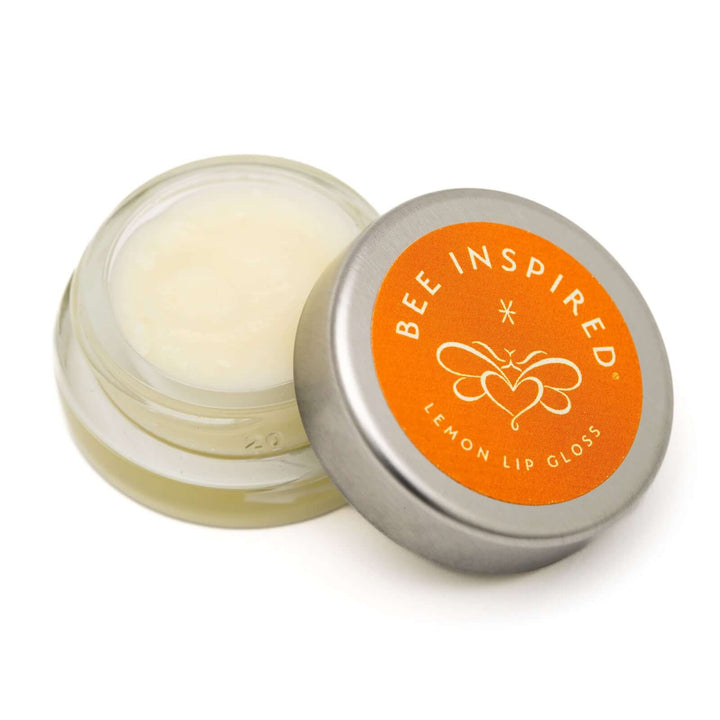 Lemon lip gloss on white 