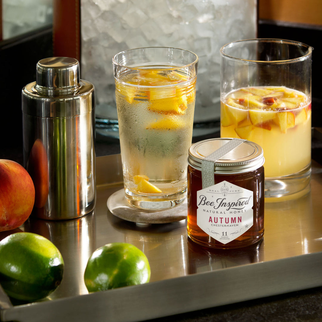peach margarita with bee inspired honey