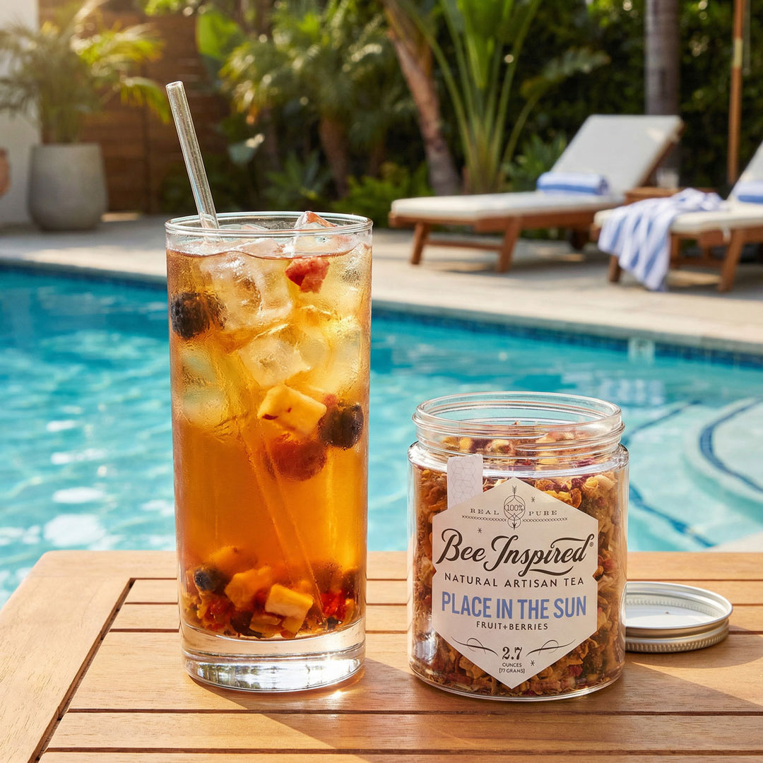 Glass of place in the sun iced tea with a jar of &