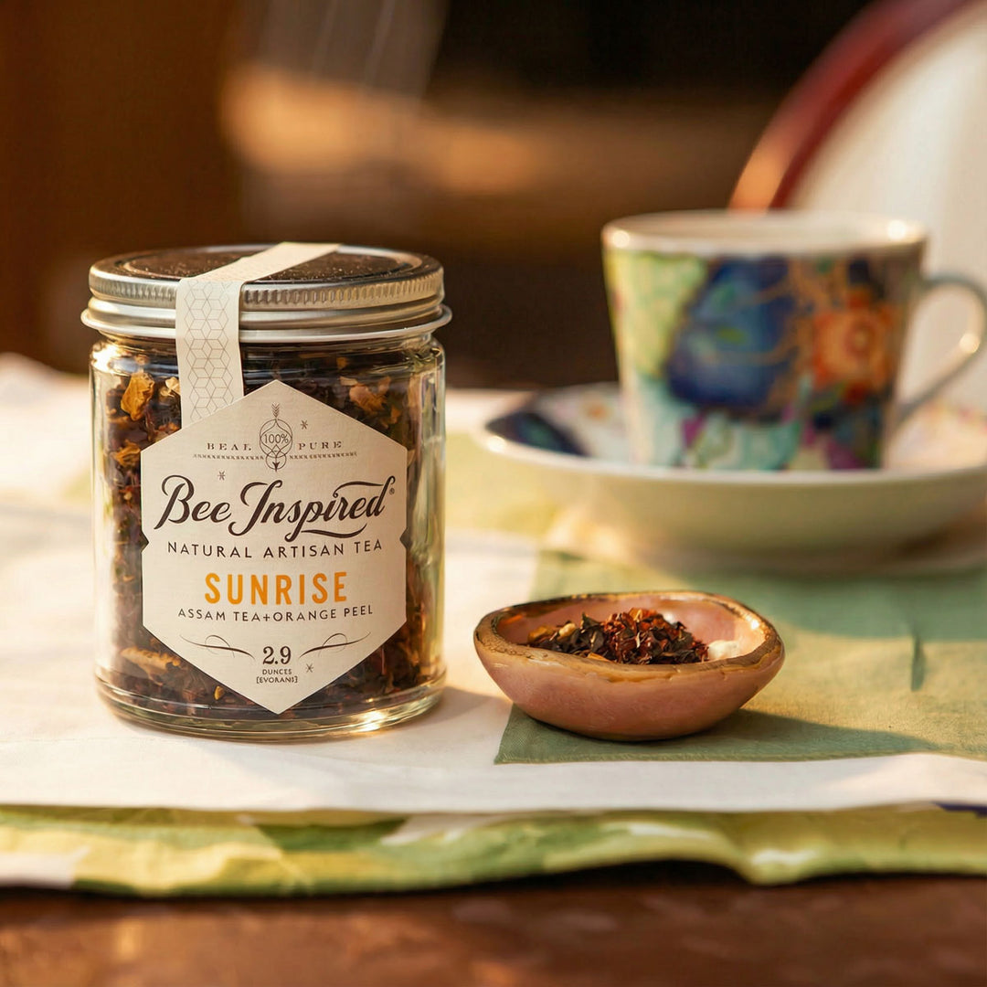 Bee Inspired Sunrise tea with a cup and saucer in the background